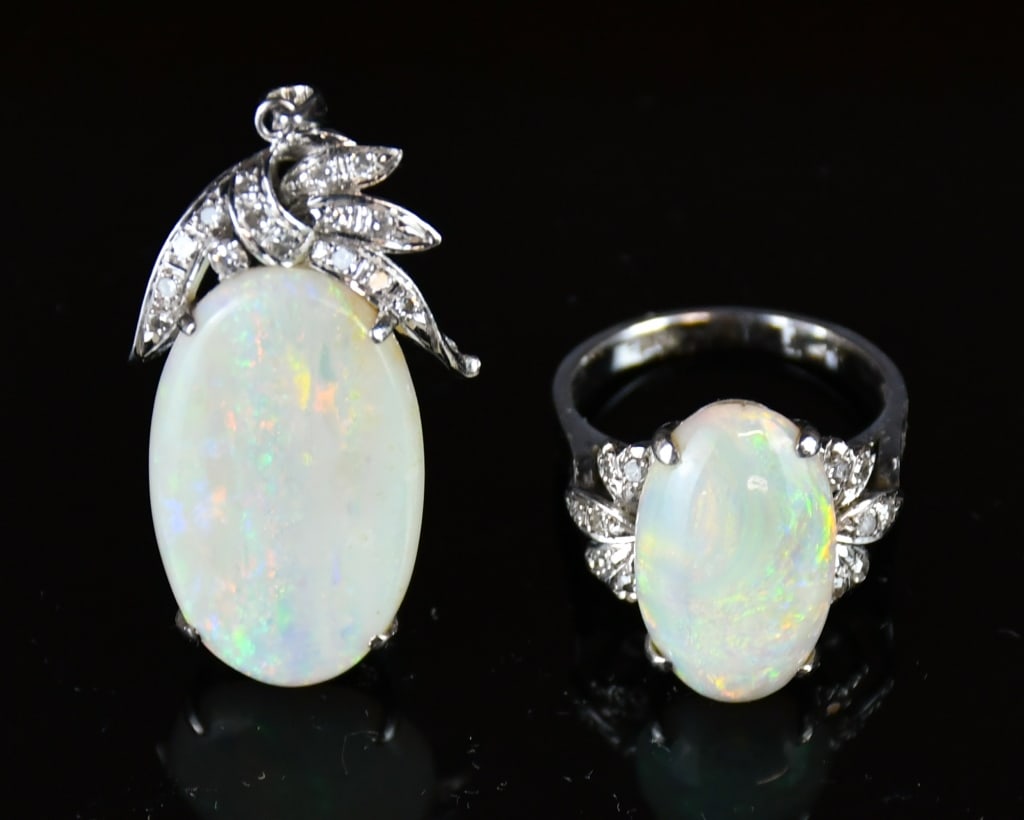 18K White Gold Opal & Diamond Pendant & Ring Set: Comprising 1 stamped 18K white gold casted opal and diamond pendant contains 1 oval cabochon cut prong set white opal 9.84ct with 15 single cut bead set natural diamonds; and a stamped 18K white gold 