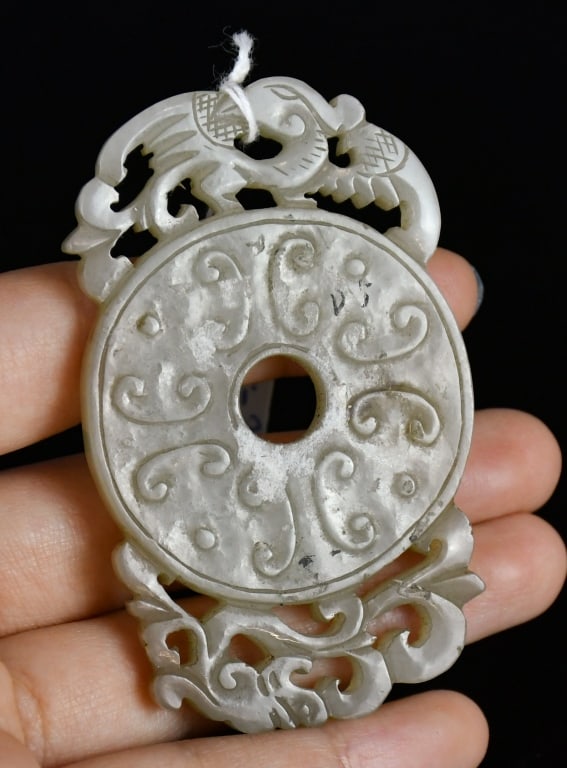 A Jade Openwork Bi Disc Qing (1 of 6)