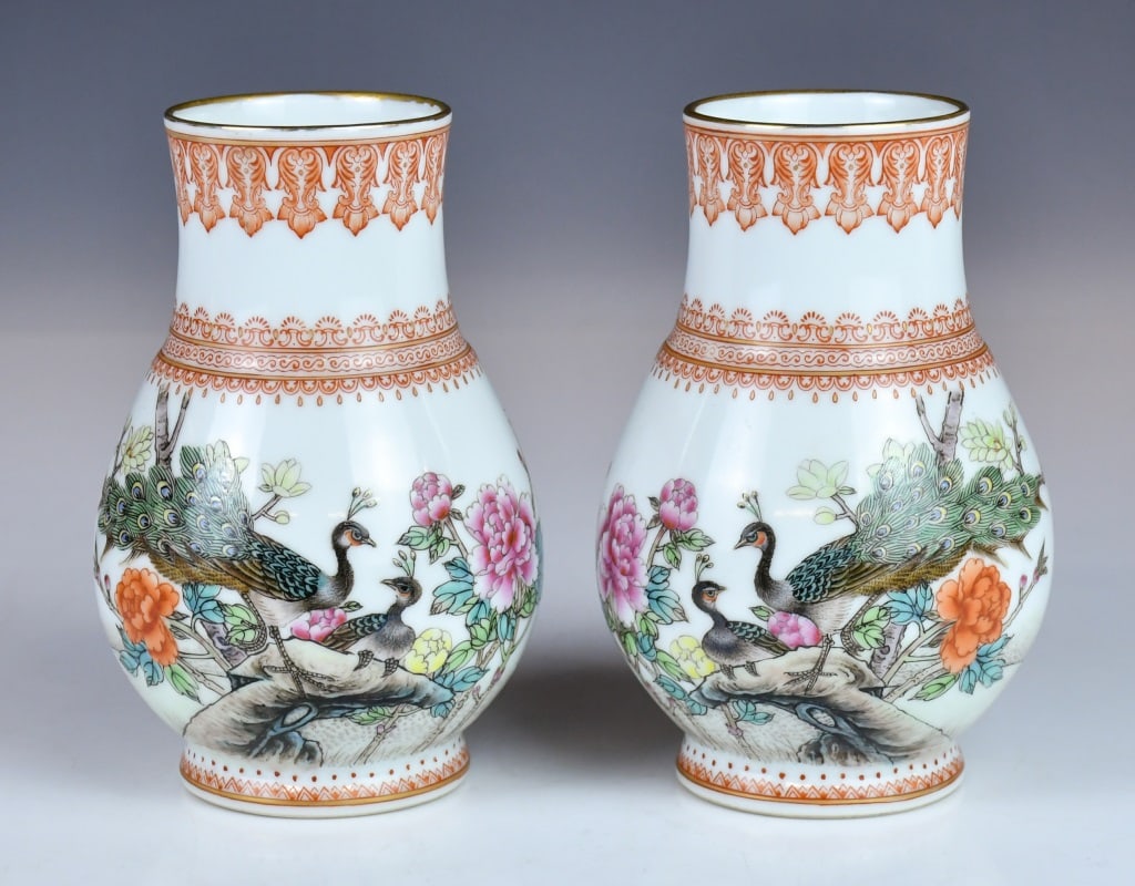 Pair of Famille Rose Vases Qianlong Mk 1950-70s: Of Hu form, each exterior painted with peacock and peony scene, four-character Qianlong mark at the base, H:15.5cm each 出口創匯期 粉彩花鳥紋