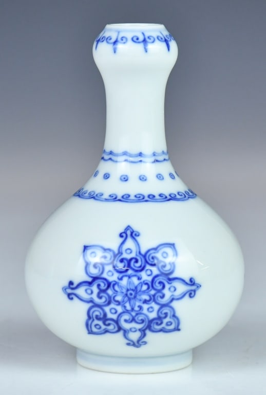 Blue & White Vase w/Yongzheng Mk Republican: The vase of a pear shape body supported on a spreading foot, tapering to a tall slender neck with a garlic-head mouth and straight mouth rim, the body decorated with floral medallion and Ruyi scroll b