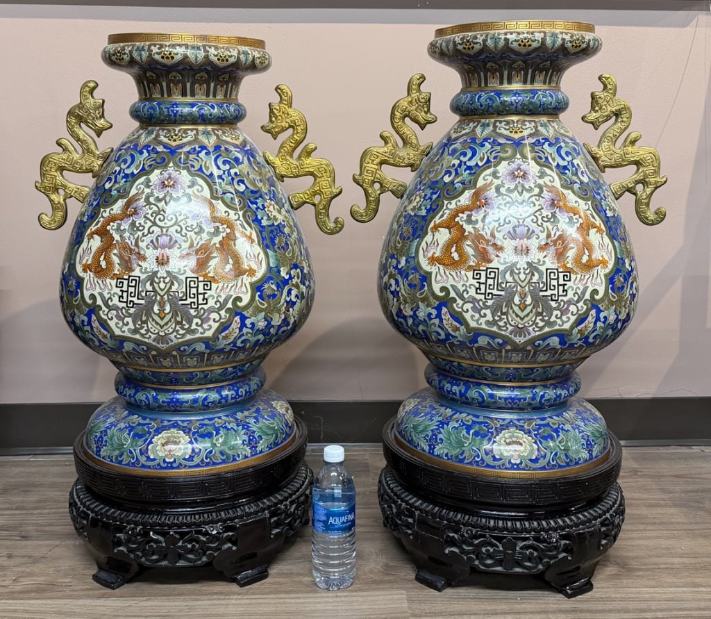 Pair of Lrg Cloisonne Enamel Vases w/Std 1950-70s: A pair of large vases, of baluster form, each enameled with double-dragon pattern within window against phoenix and floral pattern ground, pair of golden Kui-dragon handles flanked on the neck. H:65cm