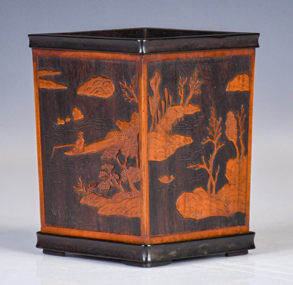 A Bamboo Carved Brush Pot Republican: Of cuboid form, each panel of the body carved in low-relief with landscape scene, 9x9x12cm 民國 雕簧四方筆筒