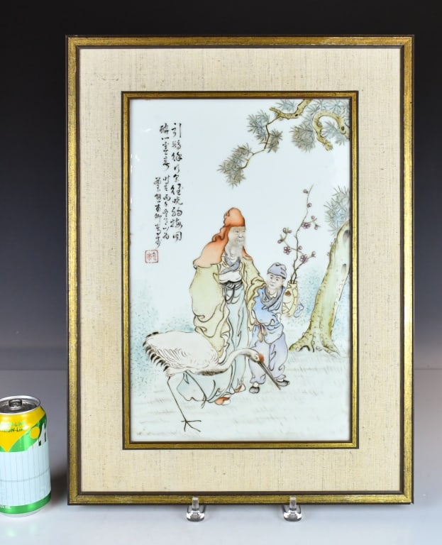 Xiong FuQing (Republican) Figural Plaque: The rectangular plaque enameled with a quintessential auspicious scene depicting Shoulao, shown in a voluminous ochre-colored robe, accompanied by a young boy attendant who carries a prunus branch in 