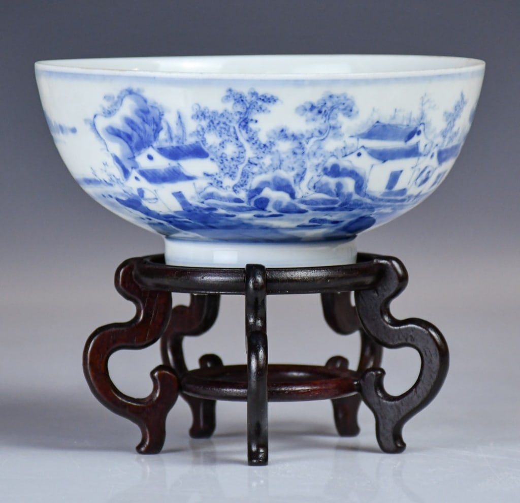 A Blue & White Landscape Bowl w/Mk Qing: Finely potted with deep rounded sides rising from a straight foot to a slightly flared rim. The exterior is finely painted in vibrant tones of underglaze blue, depicting a continuous river landscape w