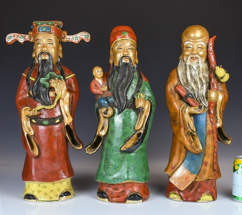 S/3 Lrg Glazed Porcelain Figures Republican: Each figure is meticulously modeled and decorated in vibrant, thick polychrome enamels, standing upright and holding their respective traditional attributes, largest H:50.8cm 民國 福