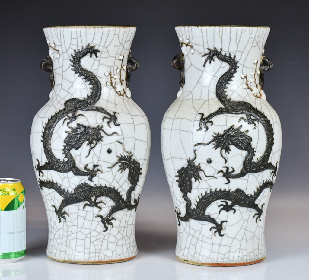 Crackle-Glazed Slip-Decorated Dragon Vases 19thC: Each of baluster form, covered overall with a creamy off-white glaze suffused with a dense network of dark iron-gray and faint brown crackle, the body decorated in high-relief dark slip with a scaly d