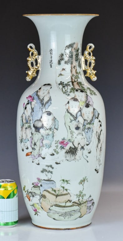 Ma QingYun (Qing) QianJiangCai Vase: The baluster body rises from a short foot to a sweeping shoulder, tapering up into a tall flared trumpet neck flanked by a pair of openwork gilded dragon handles. The front body painted with an auspic