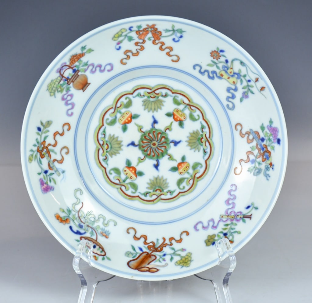 A Doucai Anbaxian Ogee Dish Guangxu Mk Republican: Potted with deep, rounded ogee sides rising from a tapered foot to a flared rim. The interior flaring walls are painted with the Eight Daoist Emblems, and a medallion at the center. The exterior profi