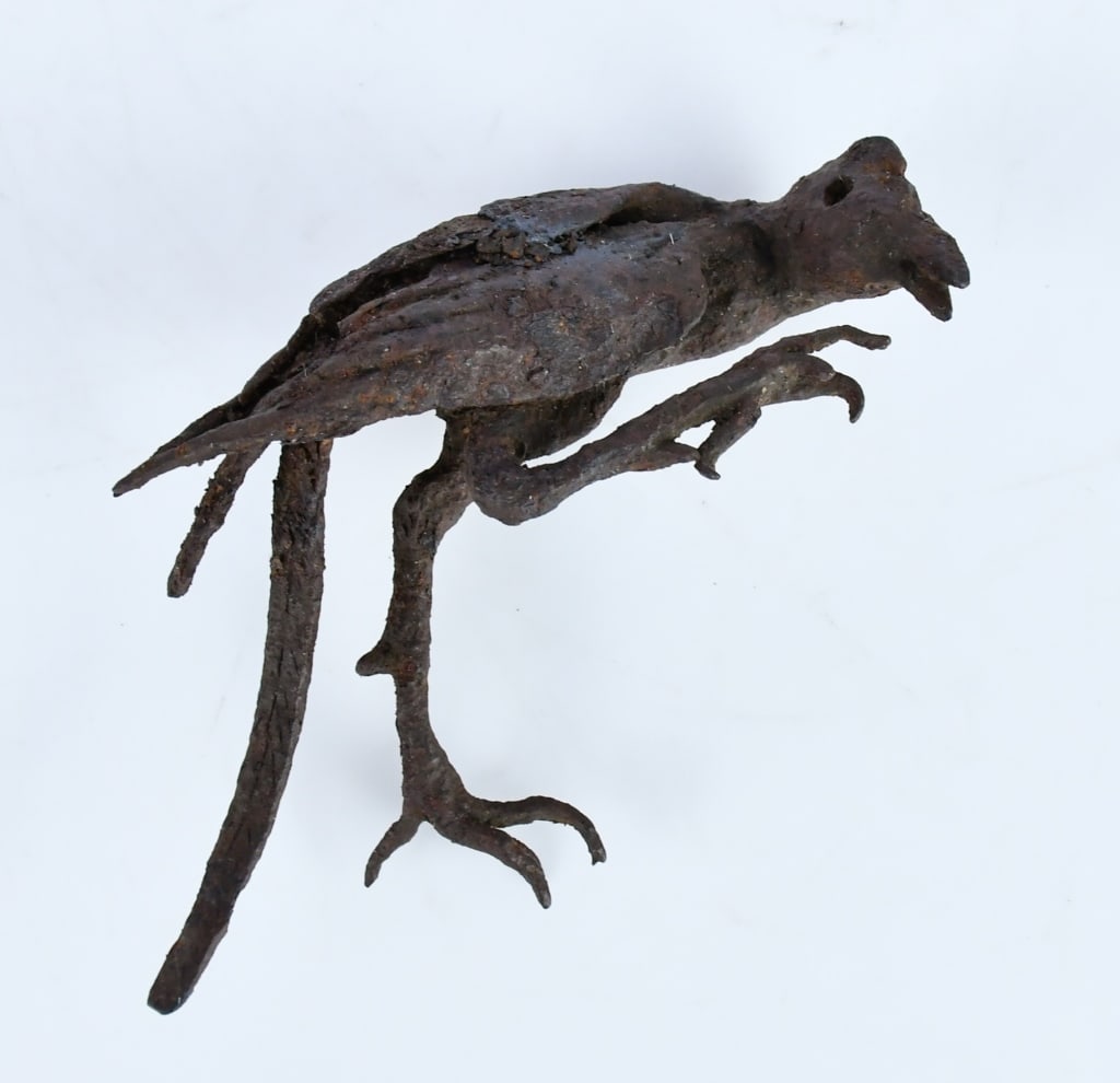 An Archaistic Style Iron Phoenix: Modelled as a phoenix with one claw raised, H: 12.4cm. 高古風格鐵鳳 來源: 多倫多西人重要藏家