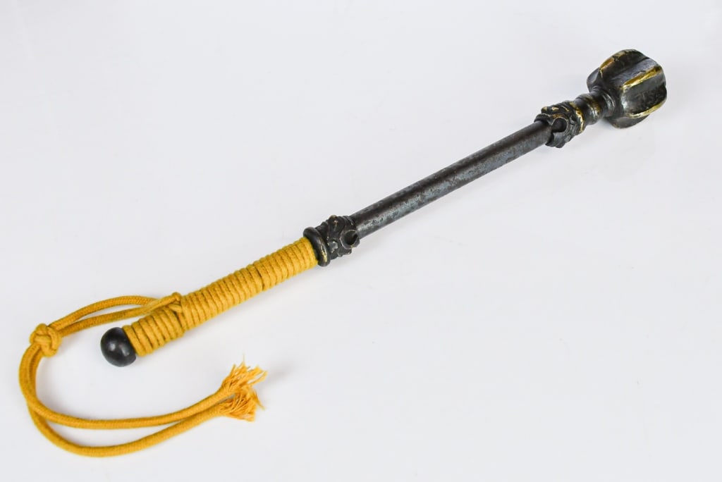 A Ming Style Melon Hammer Mace: A traditional Chinese melon hammer mace featuring a segmented metal head and a wrapped cord handle, L:32cm 明 手錘 Click here for