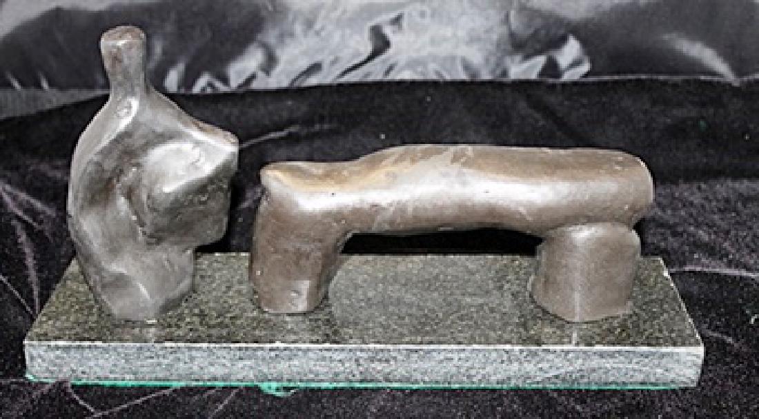 Signed Limited Edition Bronze Moore: Old recast patina bronze sculpture Henry Moore, bearing a signature in a limited edition. Dimensions approx 12 x 6 x 5.