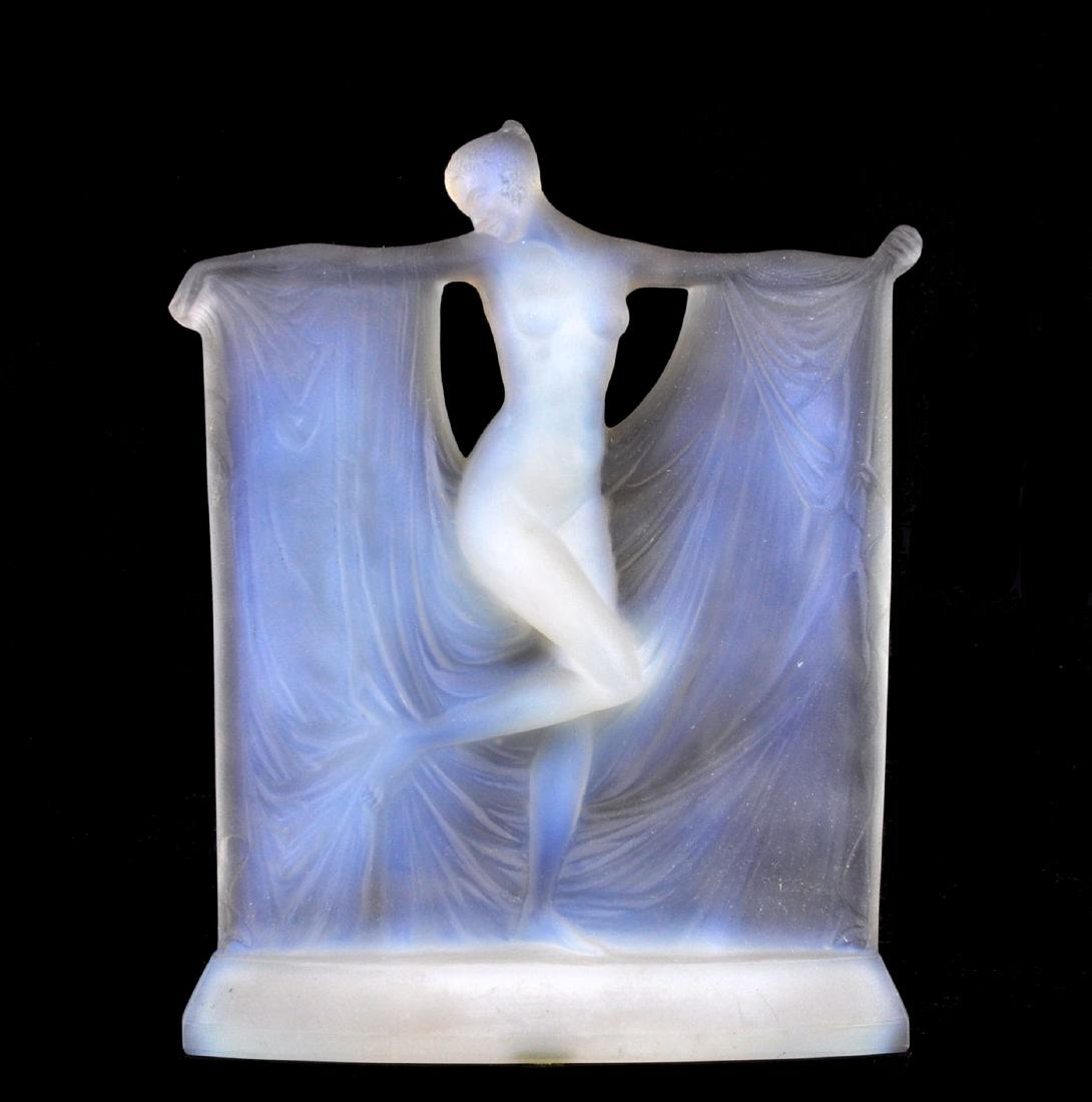 Rene Lalique Opalescent "Suzanne" Statuette: Opalescent statuette by Rene Lalique of a nude with a sheer draped curtain behind her, arms outstretched. Strong blue/white opalescent glass. R. Lalique etched signature on rear of base. 9"H x 7 3/8"W