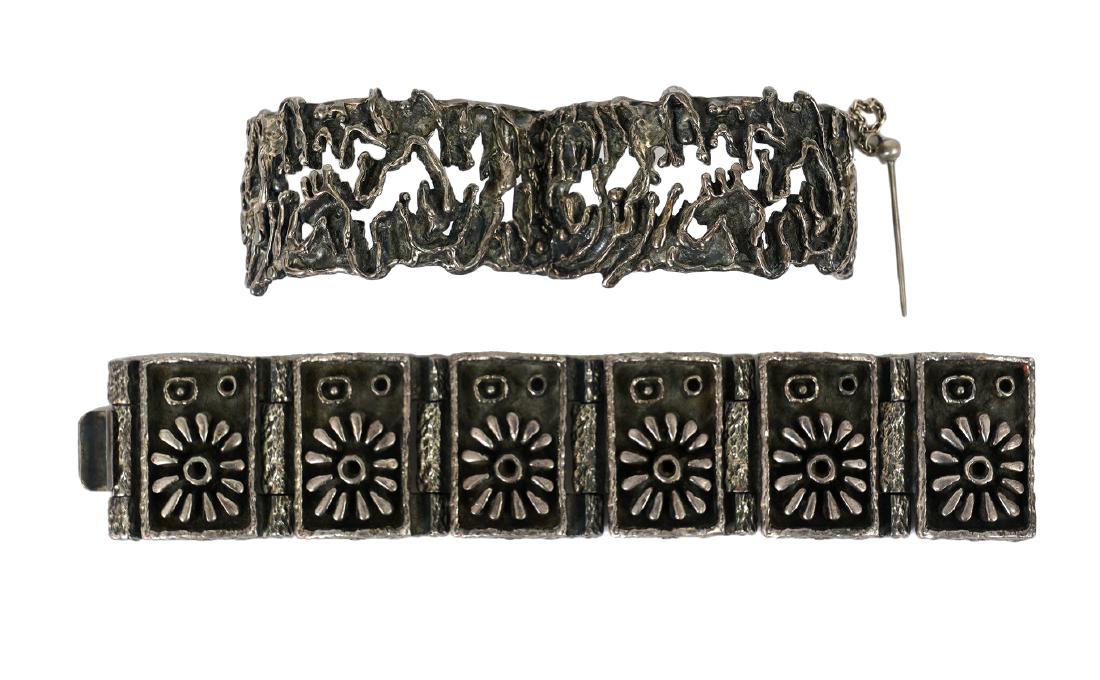 2 Guy Vidal Cuff Bracelets: Guy Vidal brutalist shadow box large daisy hinged bracelet and open work pin bracelet with pin closure, signed on inside. Good condition, see photos. Examine all photos closely. Contact AAG for more d