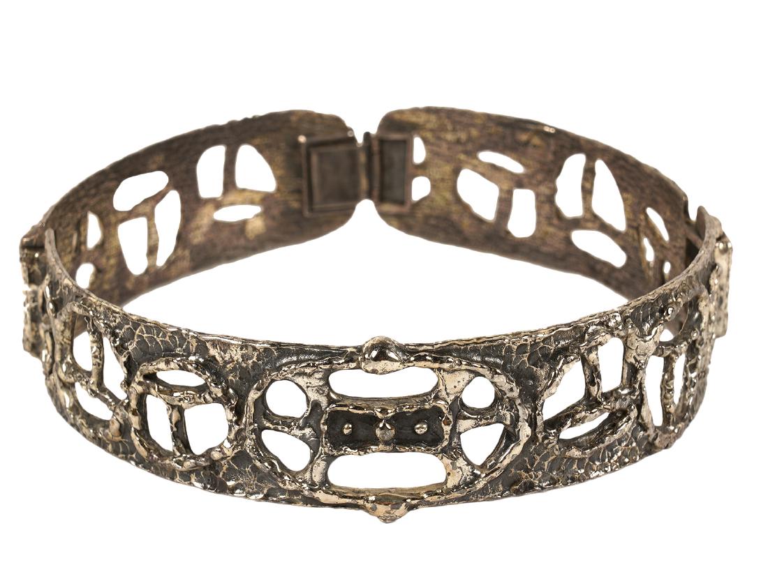 Guy Vidal Modernist 'Peace' Choker Necklace: Guy Vidal, France. Abstract modernist choker necklace in 3 segments linked together, open pierced 'Peace' design. Signed on inside. Measures 4.25" across and 13.75" outside circumference. Good conditi