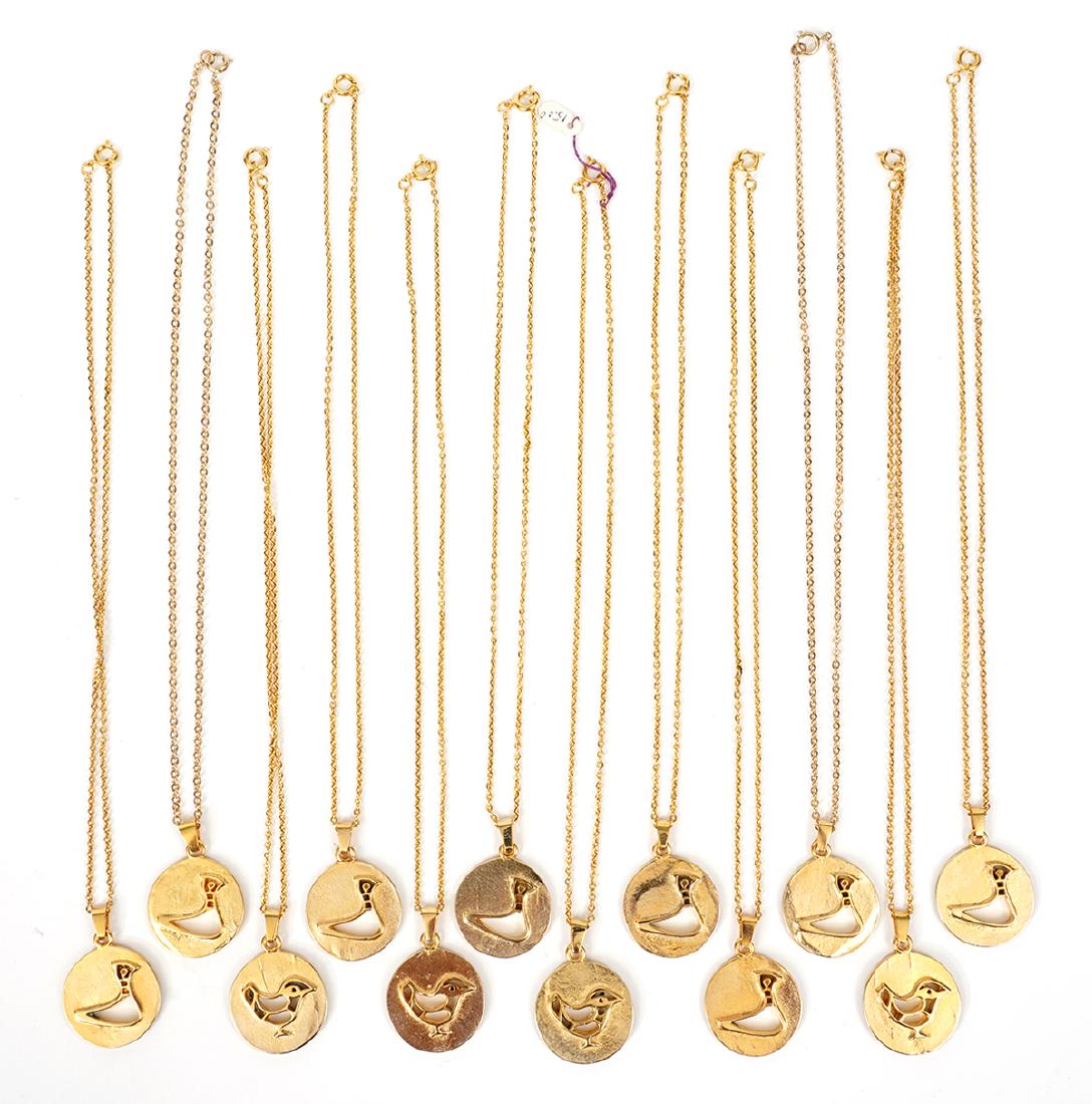 12 Gold Plated Necklaces by Bernard Chaudron: Bernard Chaudron 12 gold plated unsigned necklaces with 18" chains and circular pendants featuring a cut out of a bid. Pendant measures 1 1/8"W. Good condition, see photos. Examine all photos closely.
