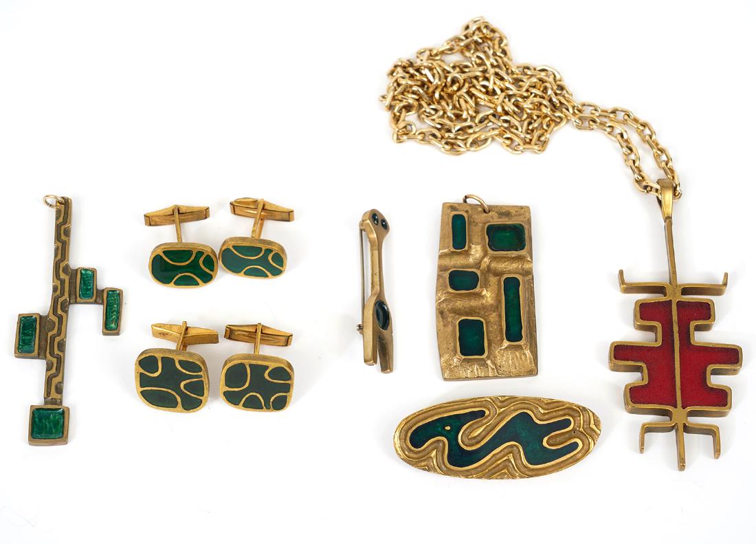 7 Pc. Bernard Chaudron Assortment: Bernard Chaudron brass pendant with green resin enamel, no chain, measures 2"L x 11/8"W. 'Stick Figure' brass pin with green resin enamel, measures 2"L x 3/8"W. Oval brass modern pin with green resin 