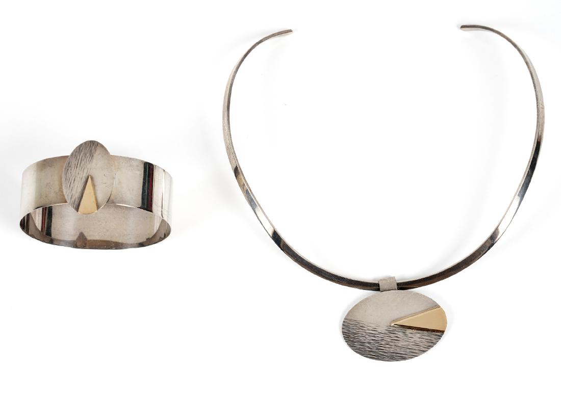 Jules Perrier Sterling & 10Kt Choker & Bracelet: Jules Perrier sterling choker with pendant and matching bracelet. Marked 10K 925 JP. Wide bracelet opens at hinged central disc. Disc and pendant are hand hammered on half and a slice of gold on the o