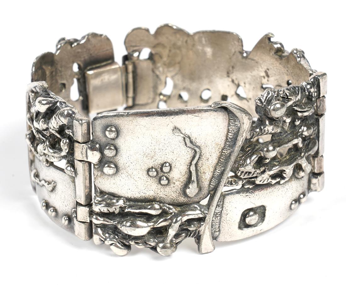 Guy Vidal Brutalist 'Seed of Life' Bracelet: Guy Vidal 'Seed of Life' bracelet signed on inside. Comprised of 3 hinged sections, clip closure. Measures 7" inside circumference x 1.5"W. Good condition, see photos. Examine all photos closely. Cont