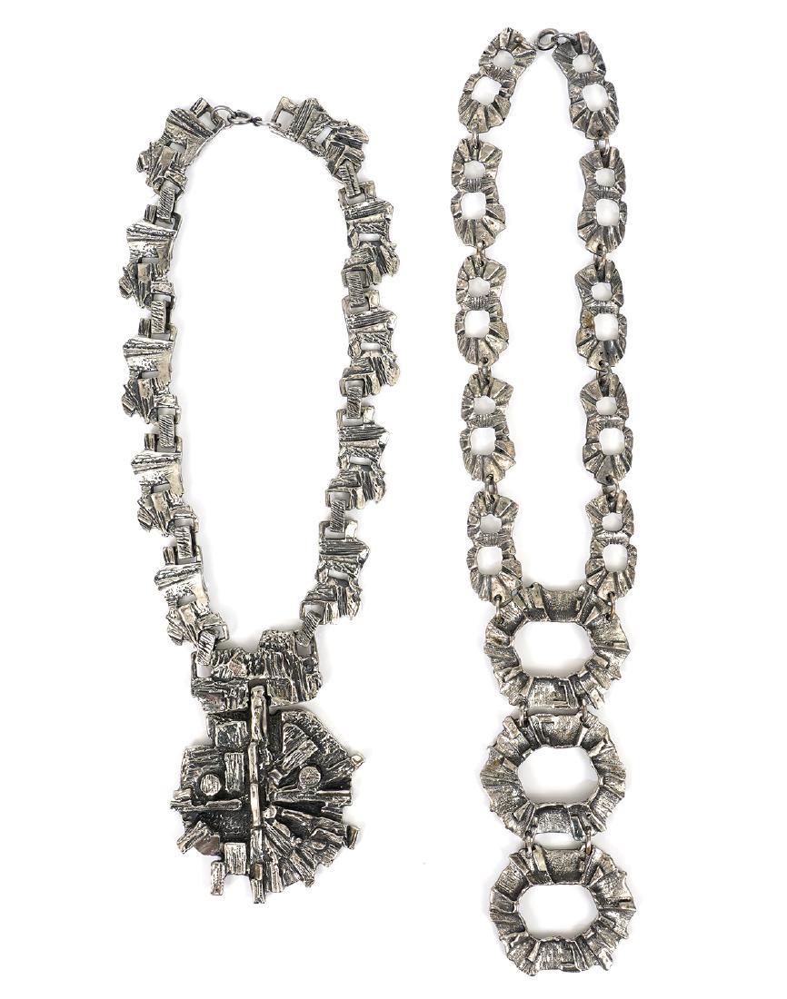Two Robert Larin Iconic Runway Necklaces: Two Robert Larin Iconic Runway necklaces, includes cubist design multi textured pendant & necklace and runway design triple circle drop necklace. Good condition, see photos. Examine all photos closely