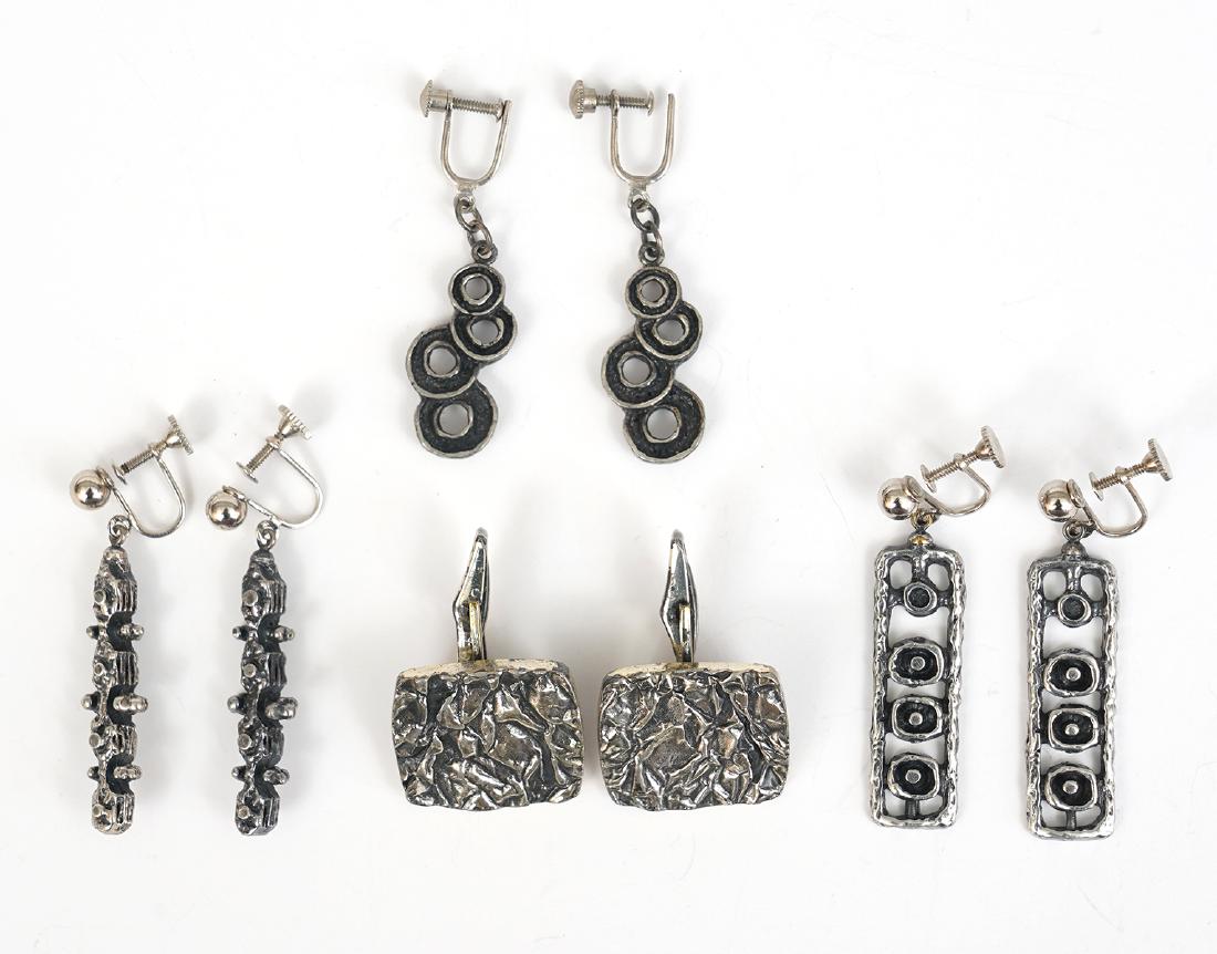 Guy Vidal Earrings and Cuff Links: Guy Vidal signed brutalist cufflinks; pair of pendant shaped oblong earrings, pair of brutalist earrings and one unmarked pair of earrings. Earrings are screw backs, not pierced. Good condition, see p