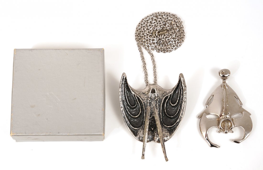 2 Rare Guy Vidal Biomorphic Silver Tone Pendants: Rare Guy Vidal 'Horse Shoe Crab' pendant with moving legs, on chain in original box and a biomorphic abstract pendant, no chain. Good condition, see photos. Examine all photos closely. Contact AAG for