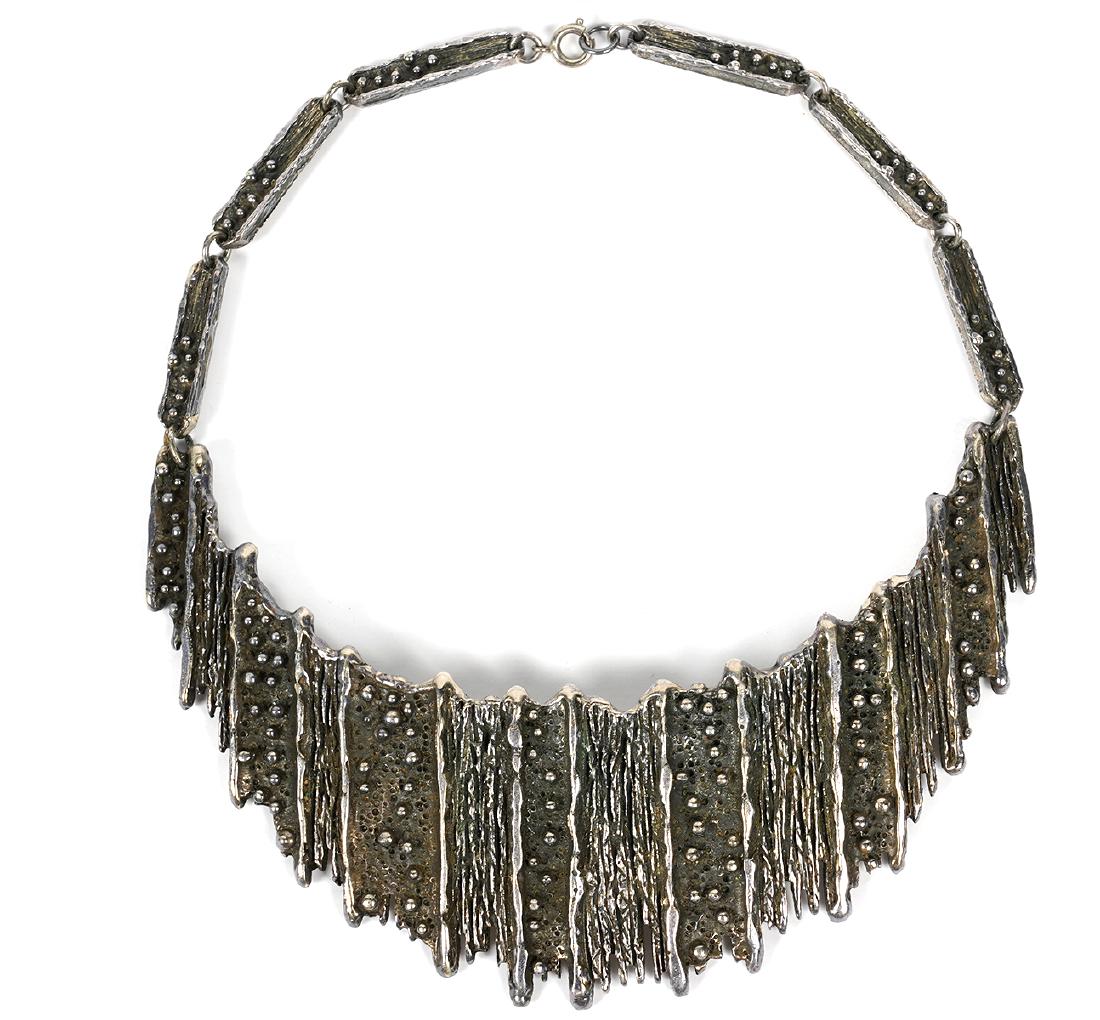 Eames Era Modernist Guy Vidal Bib Necklace: Eames Era Guy Vidal signed modernist bib necklace. Plated pewter bib necklace measures 5.5"L x 2"W. Good condition, see photos. Examine all photos closely. Contact AAG for more detailed information if