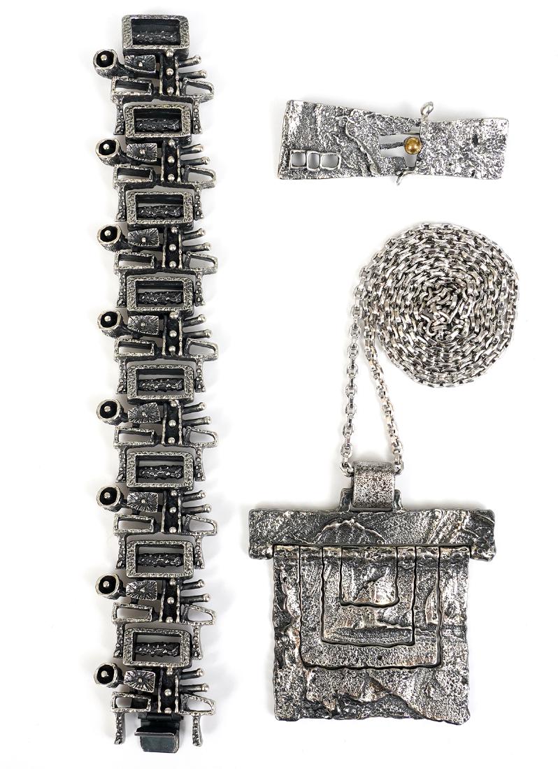 Guy Vidal Bracelet, Pendant & Pin: Signed Guy Vidal bracelet 'Complex Surfaces', kinetic pendant & chain and rectangular brutalist pin with brass ball. Good condition, see photos. Examine all photos closely. Contact AAG for more detail