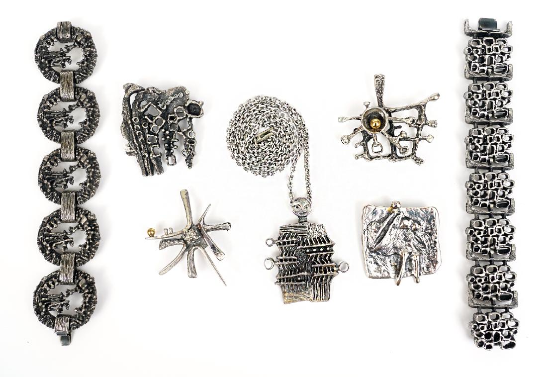 Guy Vidal 7 Pc. Assortment: Signed Guy Vidal 'Smiley Face' pendant, modernist abstract bracelet, open work cubist bracelet & 4 vintage pins. Good condition, see photos. Examine all photos closely. Contact AAG for more detailed i