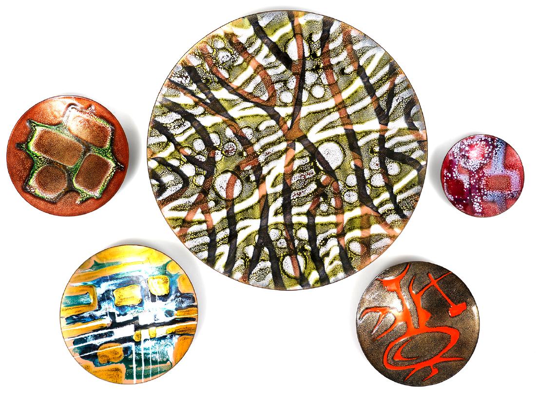 Five Enamel on Copper Abstract Plates: Five enamel chargers and plates by Pierrette LeClaire and Jules Perrier, each with different abstract designs. Signed on back. Good condition with some minor wear and crazing. 4.75" to 15.5". Examine 