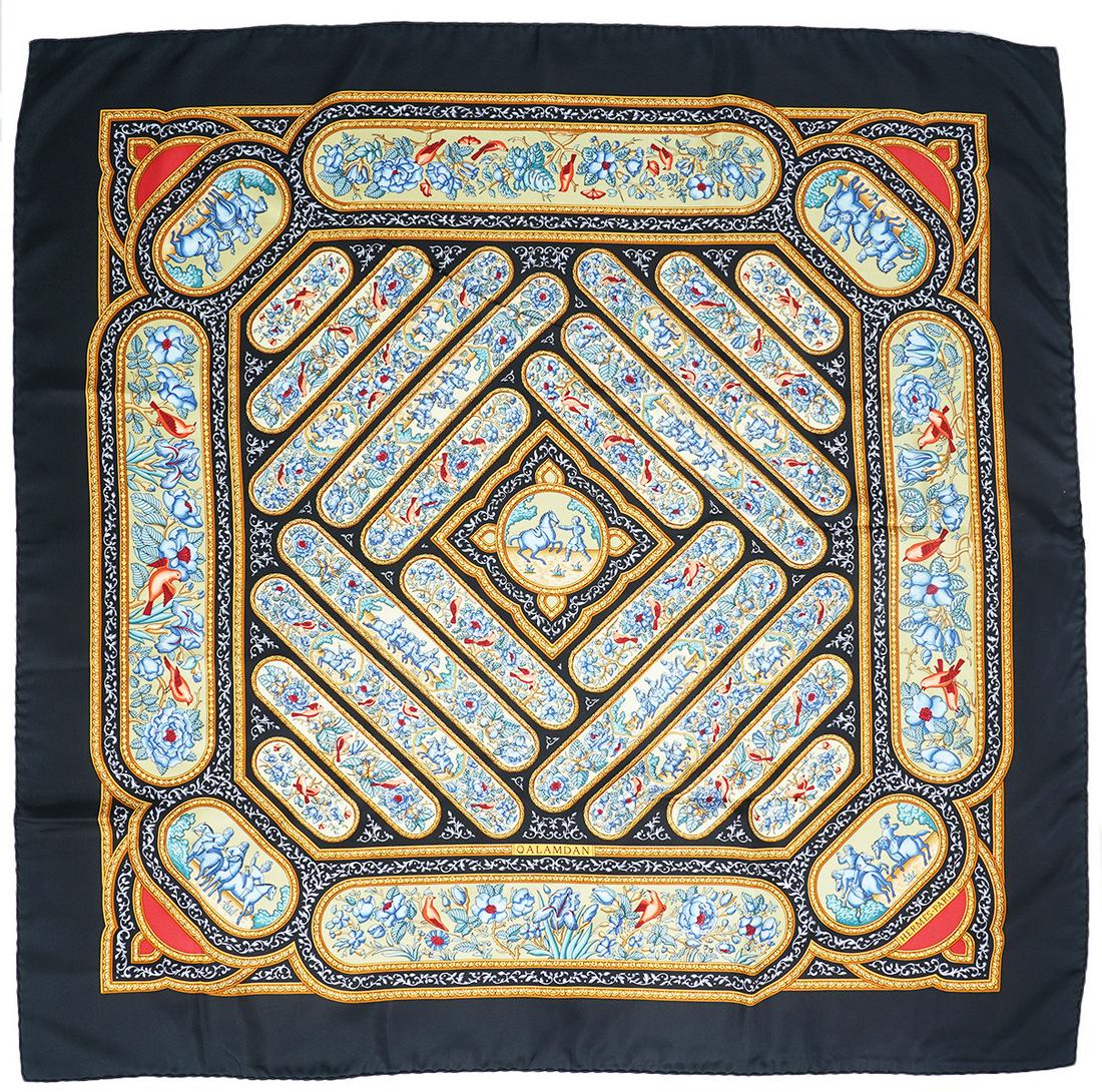 Hermes Qalamdan Silk Scarf 90cm: Authentic Hermes Qalamdan silk scarf with blue and red on a black background. Qalamdan was designed by Catherine Baschet, who has designed eight memorable carres for the Maison HermÃ¨s. This scarf w