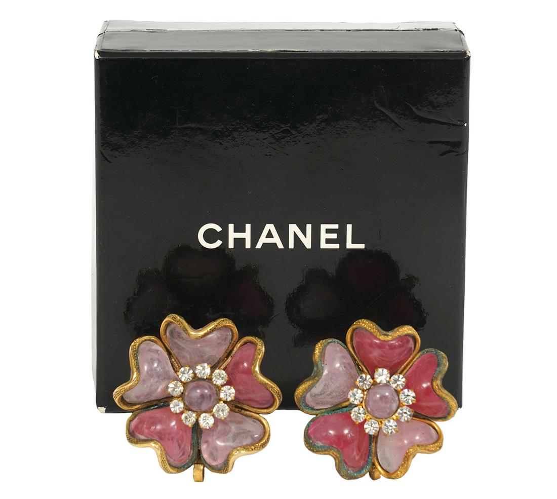 Chanel 1960's Gripoix & Crystal Earrings: Chanel poured glass, Gripoix, flower shaped clip on earrings with crystal centers. Marked Chanel on back. Measures 1.25" diameter. Condition report: good condition, see photos. Examine all photos clos