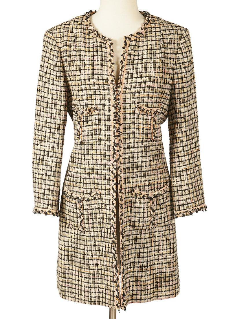 Chanel Tweed Long Blazer Size 42: Chanel long blazer size 42, in black, cream, peach & pink, lined in iconic CC camellia silk lining. Hook & eye closures. Measures bust 38"; length from shoulder 34". Comes with Chanel CC flocked hange