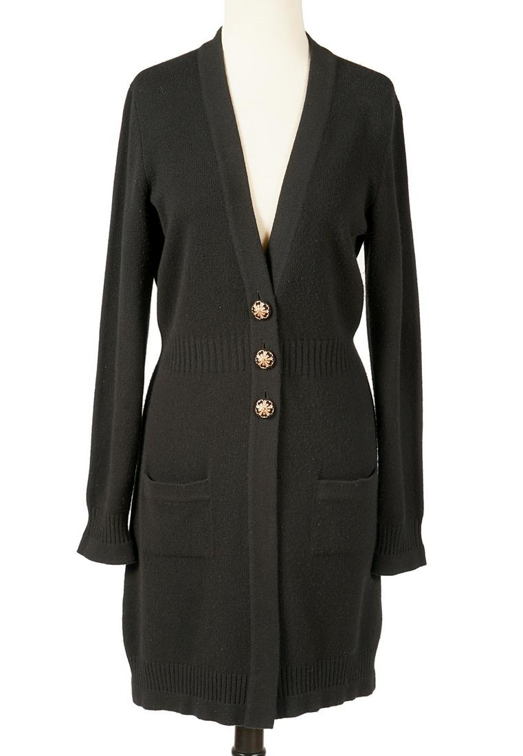Chanel Black Cashmere Long Sweater Sz 40: Chanel 2007 black cashmere long sweater with ribbed waist. Ornate CC 3 button closure. Measures bust 38"; waist 32"; length from shoulder 36". Comes with Chanel CC flocked hanger. Condition report: sl