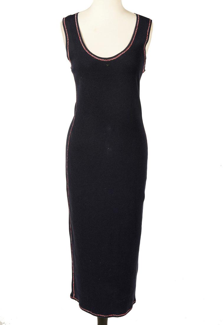 Chanel Blue Cashmere Long Sweater Tank Dress Sz 42: Chanel navy blue cashmere and cotton blend body hugging maxi tank dress, accented with red & white thread trim and a tiny CC, size 42. Comes with Chanel CC flocked hanger. Measures bust 36"; hip 38"; 
