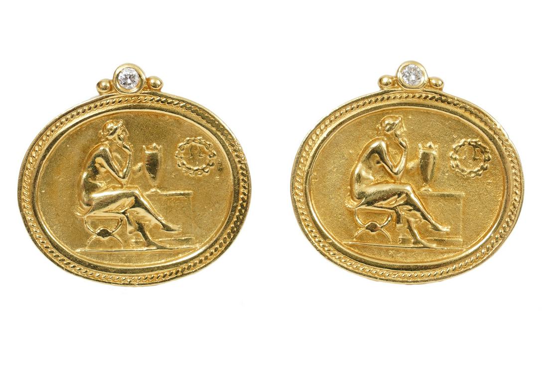 Seidengang 18Kt. YG & Diamond Omega Clip Earrings: Earrings are oval shaped, repousse finish with omega clips and posts, each set with one round brilliant cut diamond. The diamonds are estimated at .03/100 with color as G and clarity as SI1. Weight is