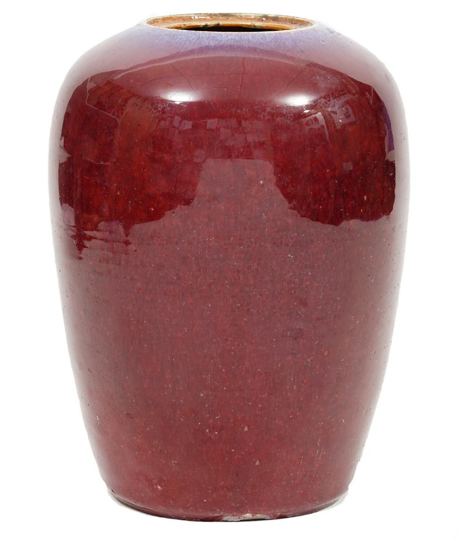 Sang de Boeuf Oxblood Porcelain Vase: Sang de Boeuf oxblood porcelain vase with glazed finish. Measures 11.5"H x 8.25"W. Condition report: good condition, some rough edges around the base, see photos. Please examine all photos closely. Co