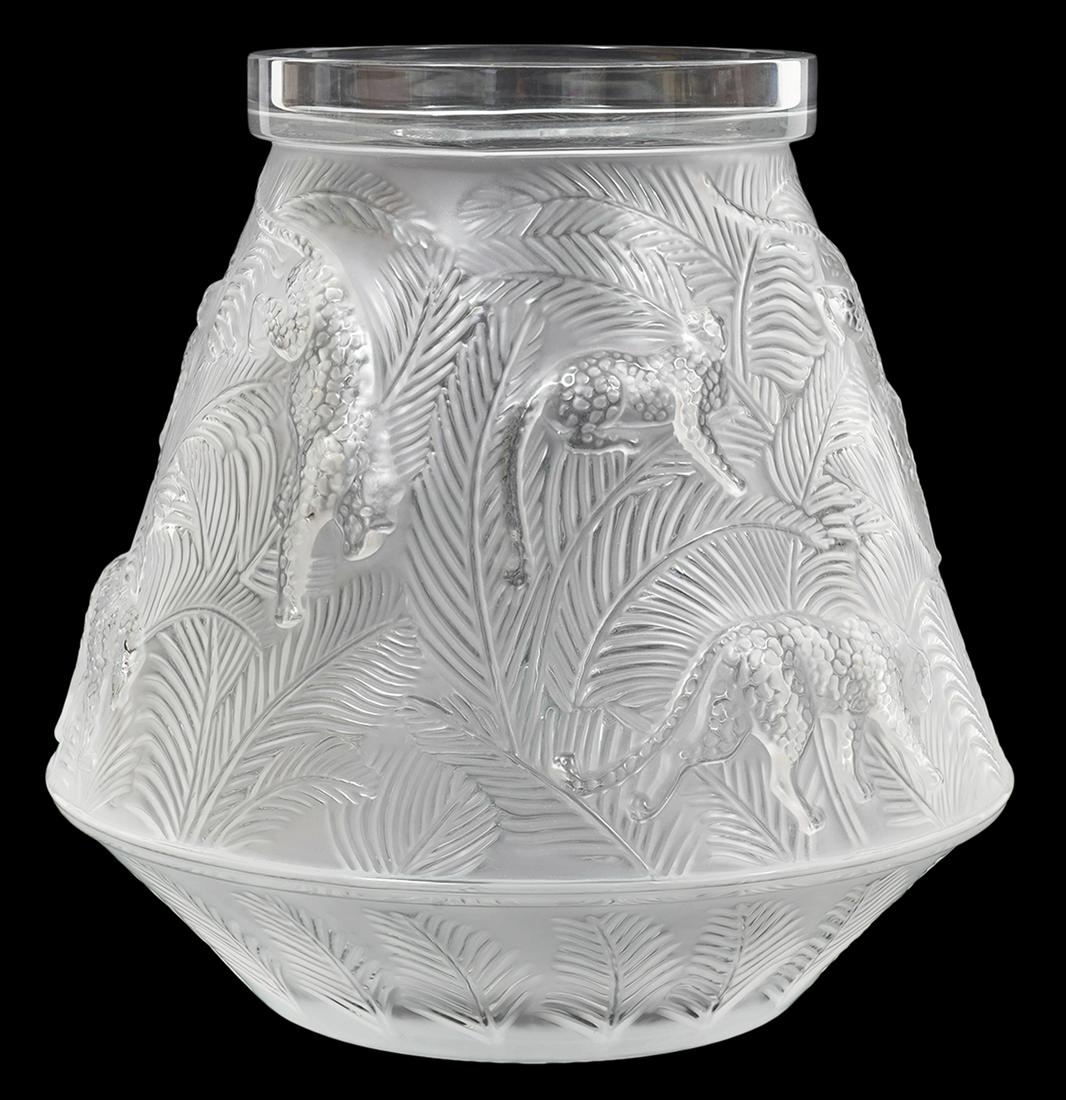 Lalique 'Jaguar' Clear & Frosted Angular Vase: Lalique clear and frosted angular vase with jaguars in a jungle foliage setting. Measures 10"H x 10"W. Condition report: good overall condition, surface wear to bottom, see photos. Please examine all 