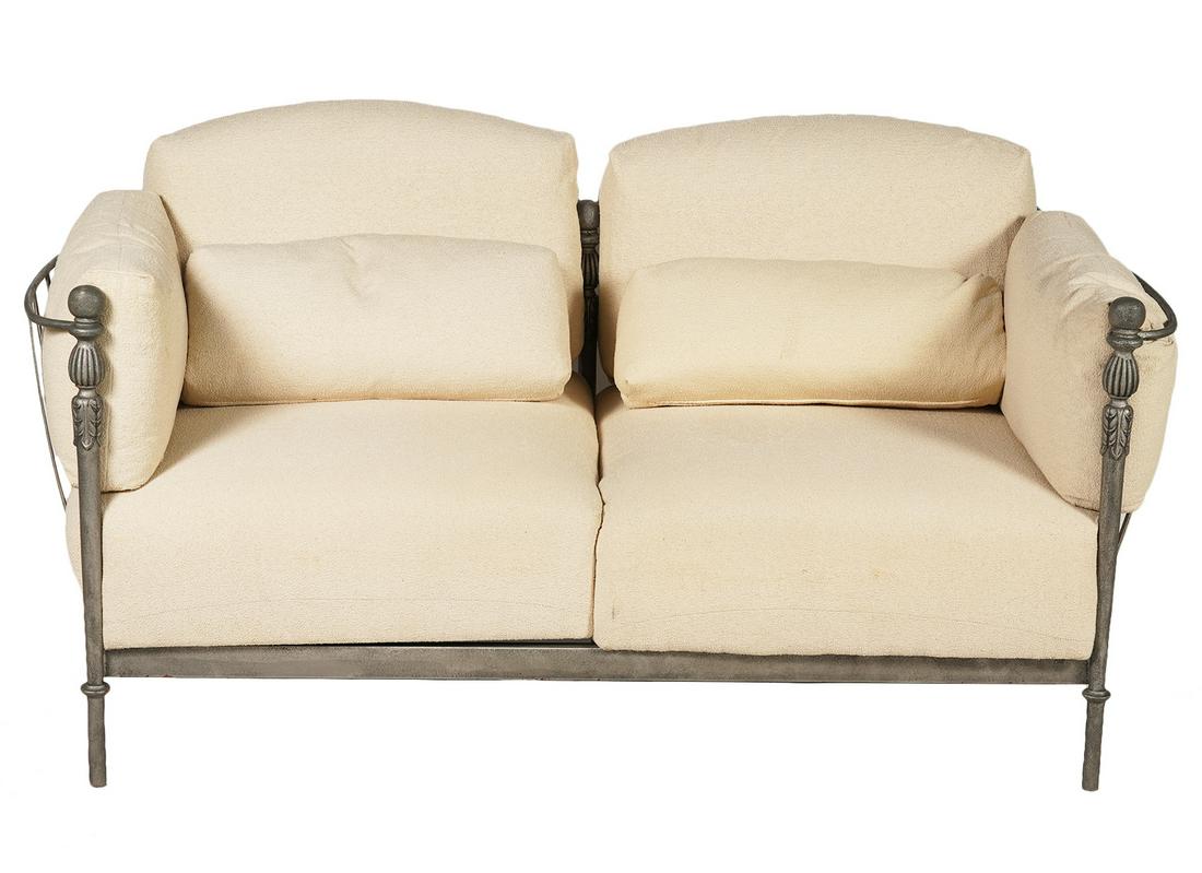 Michael Taylor Montecito Aluminum Framed Loveseat: Michael Taylor Montecito aluminum framed loveseat in gun metal powder coat finish. Frame is accented with acanthus motifs and ball finials and cradles over sized thick cream cushions in mildew resista