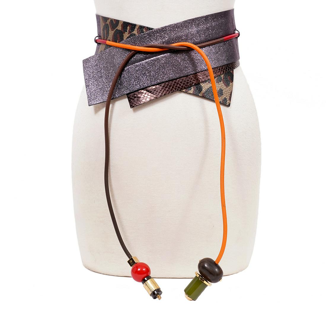 Louis Vuitton Vintage Metalic Tie Belt: Louis Vuitton vintage belt featuring purple metallic leather, animal print metallic leather and bronze snake skin tied with a multi color cord. At each end of the cord is LV hardware, LV square beads 