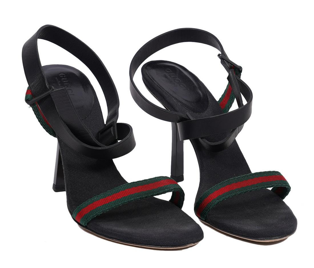 Gucci Classic Stripe Ankle Strap Heels Size 6B: Gucci black heels with classic red and green stripes featuring an ankle strap. Size 6, 3.5" heel. Made in Italy. Condition grade: 2. Includes shoe bags. Examine all photos closely. Contact AAG for mor