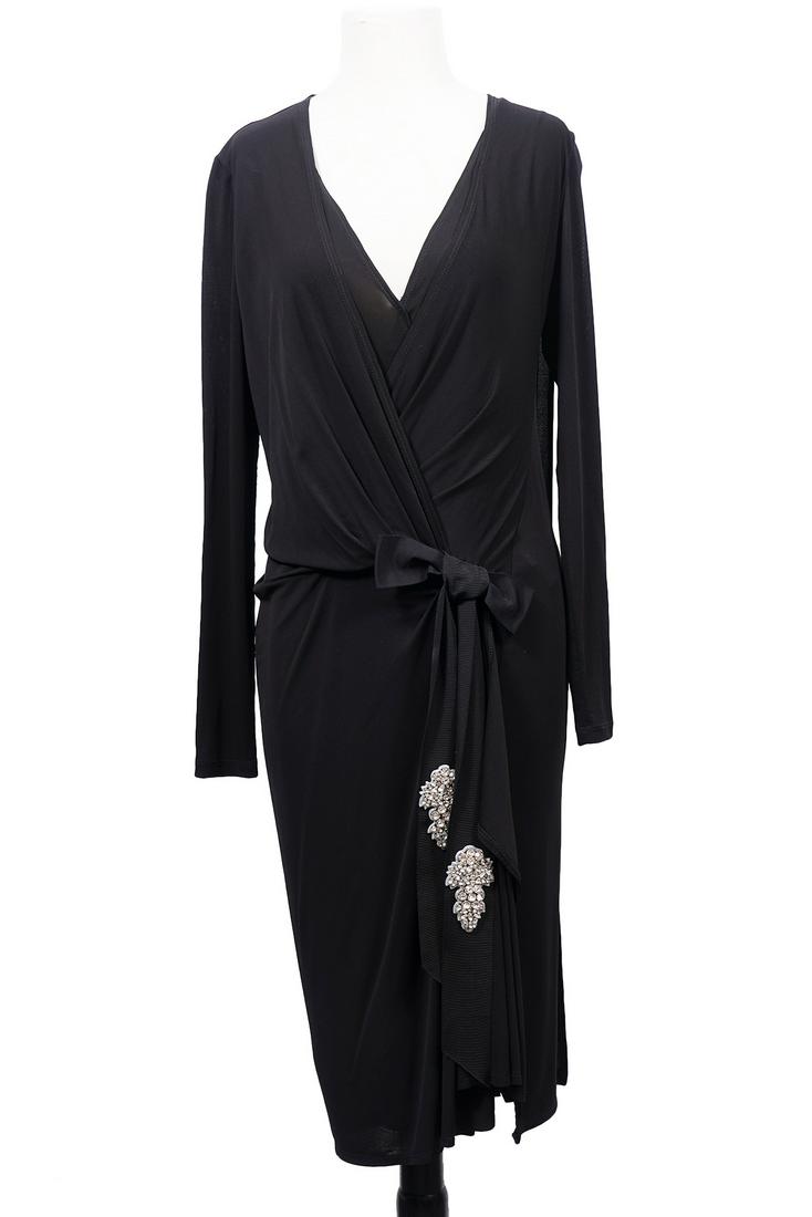 Vintage Donna Karan Black Cocktail Dress Sz 4: Vintage Donna Karan black cocktail dress in flowing rayon with a touch of spandex featuring a faux wrap style with wide grosgrain bow accented with rhinestone appliqués. Size 4, Bust 34", Waist 30", 