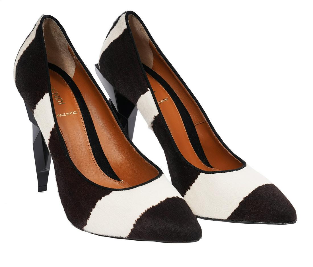 Fendi Pony Hair Pumps Size 40: Fendi black and white pony hair pumps featuring sculptural heels. Size 40. Heel height: 4.5". Made in Italy. Condition grade 2. Extremely light wear on soles only. Examine all photos closely. Made in 