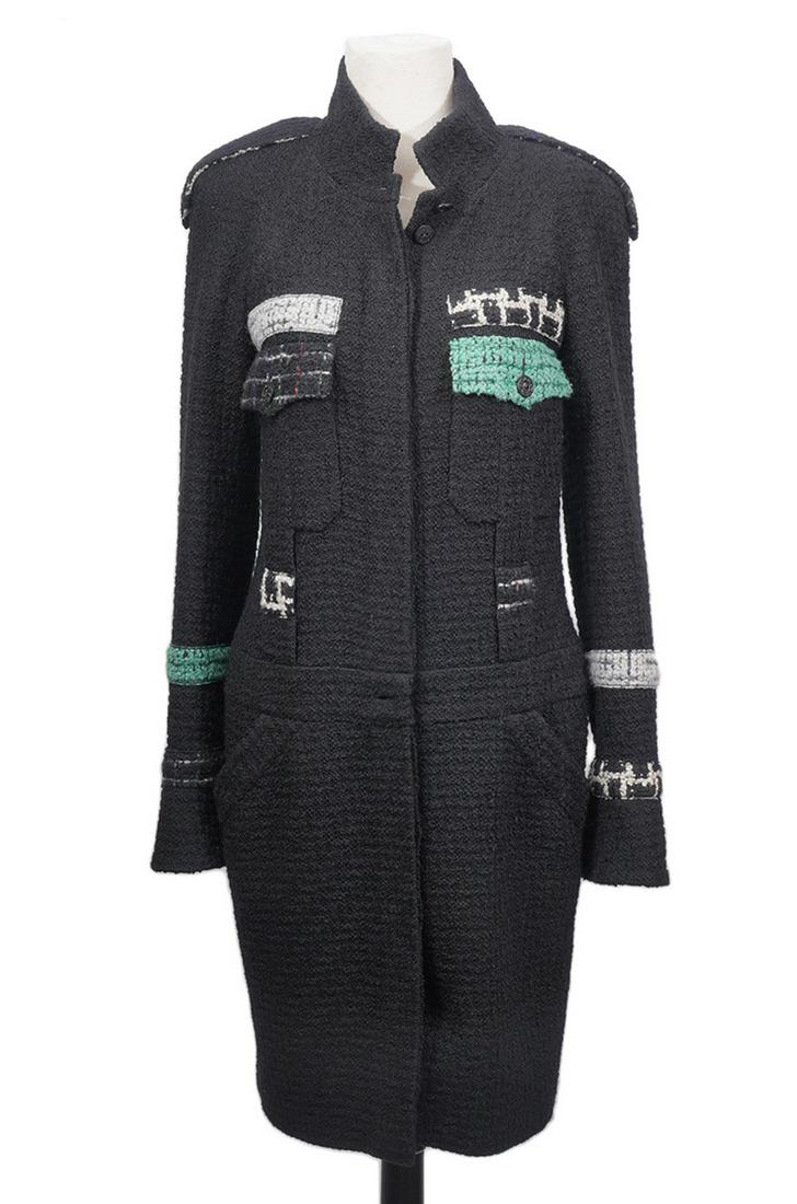 Chanel Black Tweed Knee Length Coat Size 42: Exception Chanel black tweed knee length coat with bright emerald green and white boucle accents and CC buttons. Buttons down the front. Lined in black silk. Size 42. Bust 38", Hip 40", Length from sh