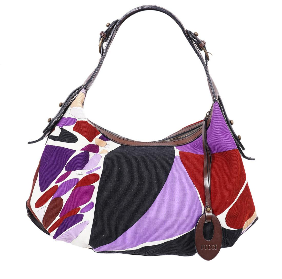 Pucci Purple Corduroy Brown Leather Shoulder Bag: Emilio Pucci hobo shoulder bag in multi shade purple corduroy and trimmed in brown leather with a brown leather strap. Zipper closure. Lined in purple signature fabric with a zipper pocket and a slip 