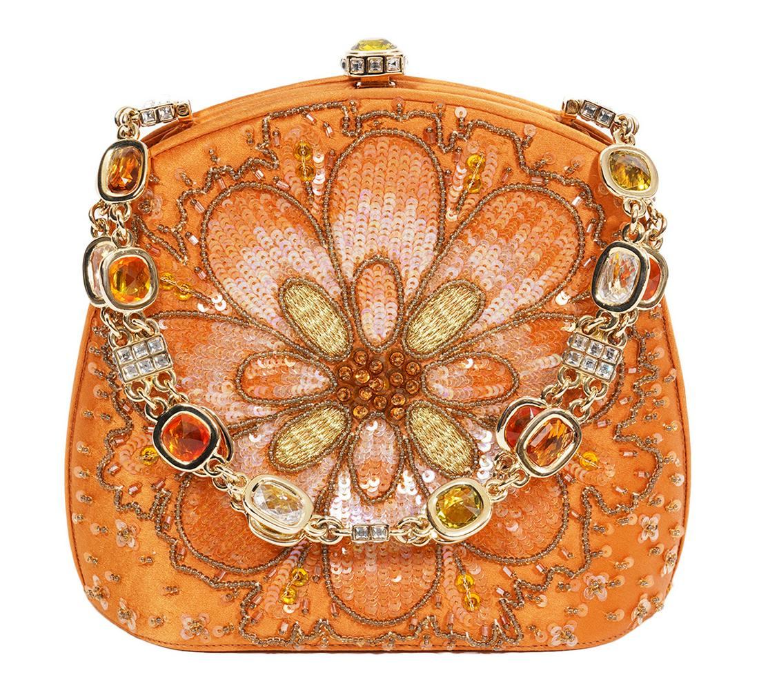 Judith Leiber Orange Satin Beaded Jeweld Bag: Judith Leiber orange satin beaded evening bag featuring a gold chain strap lined with clear, citrine and topaz crystals. Push lock closure is embellished with a bezel set citrine crystal. Lined in sat