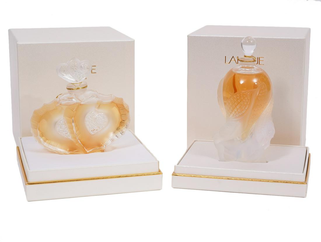 Lalique Parfum Les Elfes 2.5oz Limited 2002: Lalique Parfum, Les Elfes, 2002 Flacon collection. 2002. 2.5oz. Condition grade: 1. NEW, sealed and in original box and outer box. Numbered 390 and signed. Examine all photos closely. Contact AAG for