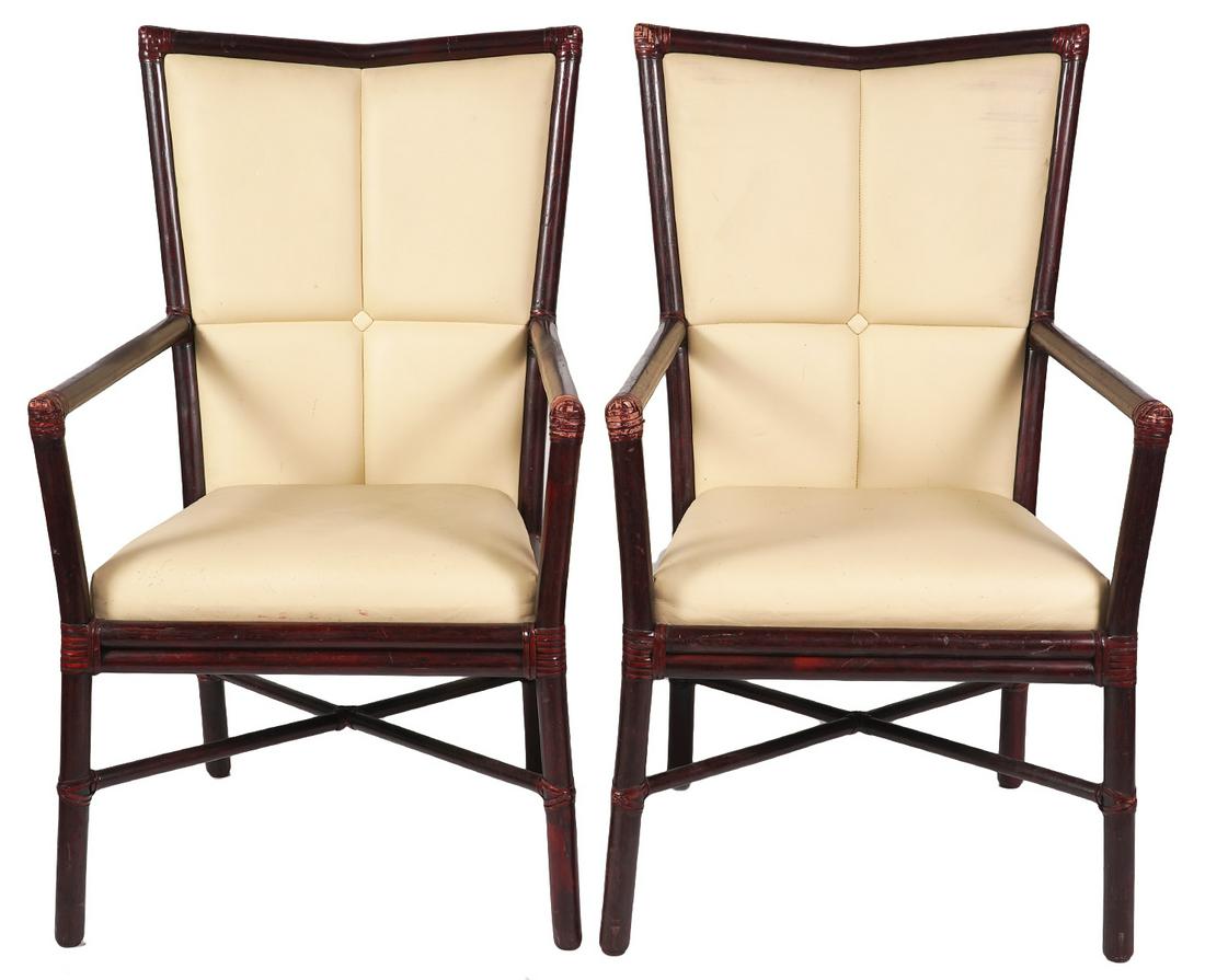 Pr. McGuire High Back Rattan Chairs: Pair of vintage McGuire high back rattan chairs by Orlando Diaz-Azcuy. Measures 40"H x 23"D x 24.25"W. Condition report: wear to upholstery, see photos. Please examine all photos closely. Contact AAG