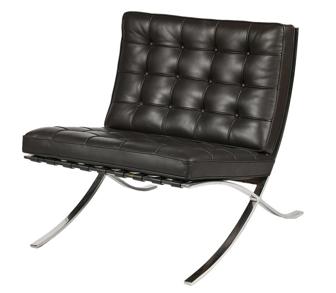 Barcelona Chair by Knoll: Barcelona chair by Knoll designed by Mies van Der Rohe and Lily Reich with polished chrome finished frame and cushions that appear to be Volo black leather. Tags on underside of bottom cushion, Knoll 