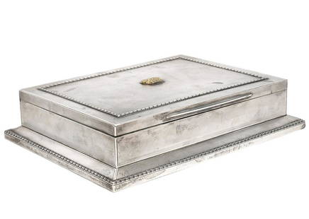 Asprey of London Sterling Silver Cigar Box: Asprey of London sterling silver wood lined cigar box with leather bottom. Engine turned decoration with braided trim around the edges. Hallmarks on rim and inside top cover. Accented with a small gol