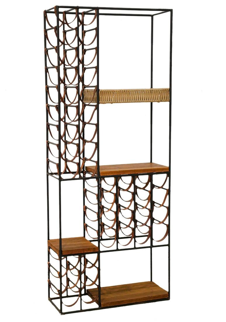 Arthur Umanoff Mid 20th C. Wine Rack: Arthur Umanoff, American (1923-1985). Mid 20th C. wine rack by Umanoff in forged wrought iron, leather and maple. Rack has 3 maple shelves, 1 basket shelf and spaces for 40 wine bottles. Measures 66.2